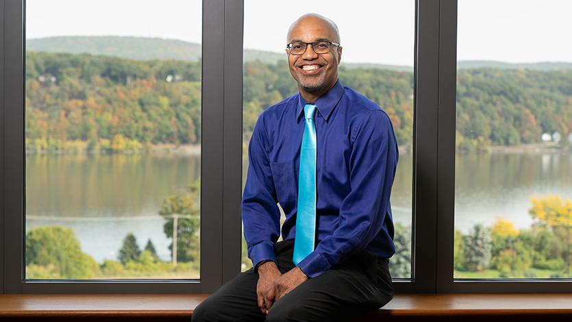 Image of Dr. Buckmire in Hancock office. 